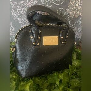 Bebe Black Satchel/Crossbody convertible purse with Gold Accents